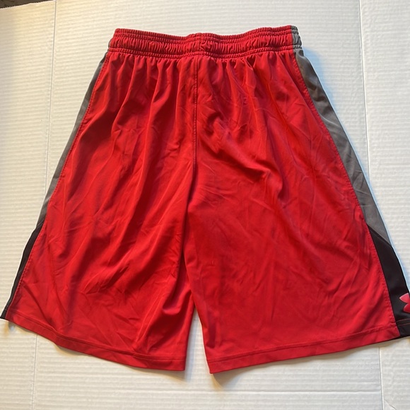 Under Armour red athletic shorts with black and grey on side of shorts. - Picture 3 of 5